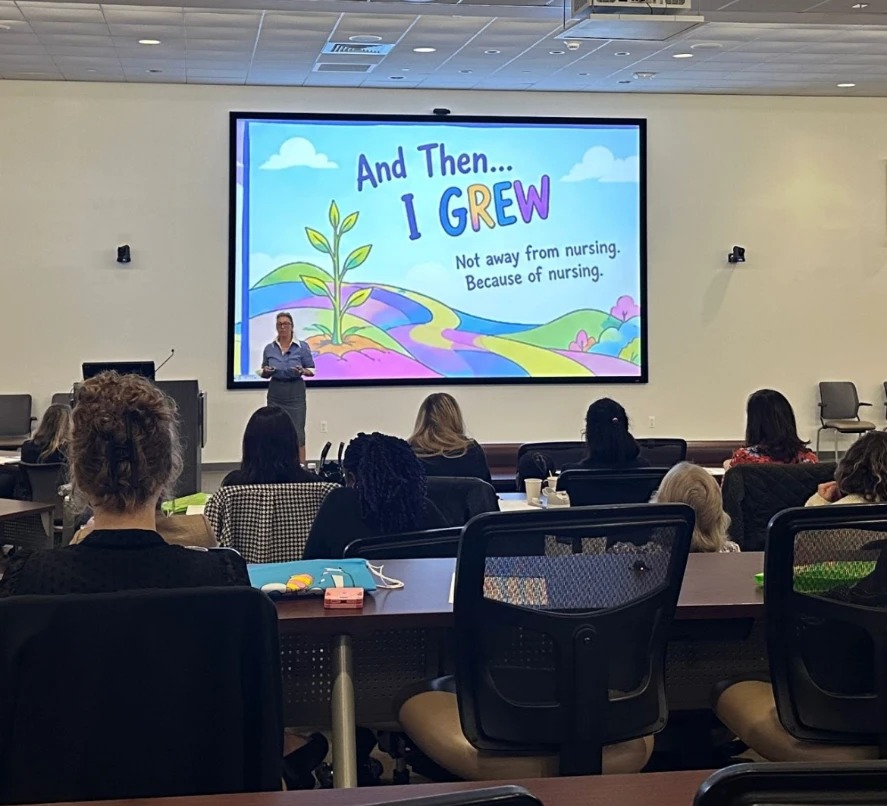 Ronit Schwartz presenting “And Then… I Grew: Not away from nursing. Because of nursing.” to an audience